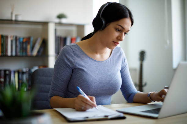 istock Young woman working from home 1354627934