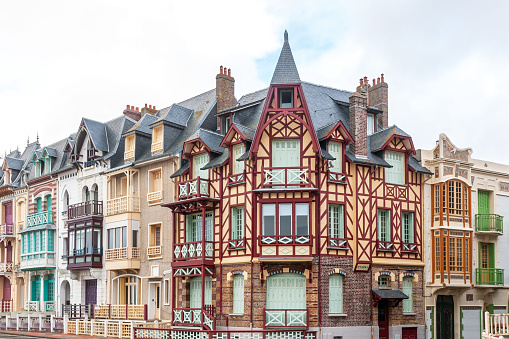 Colorful facades at Promenade Mers Le Bains, Normandy, France.