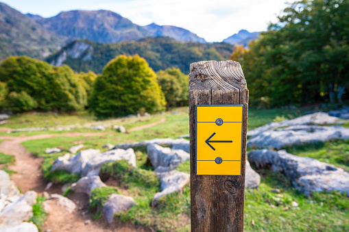Hiking directional sign in somport Pyrenees frontier between Spain and France in Aspe
