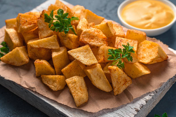 istock Patatas bravas close-up, traditional Spanish snack, tapas 1354641650