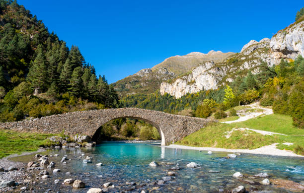 istock San Nicolas romanesque bridge Ara river Bujaruelo, Ordesa Huesca 1354643933