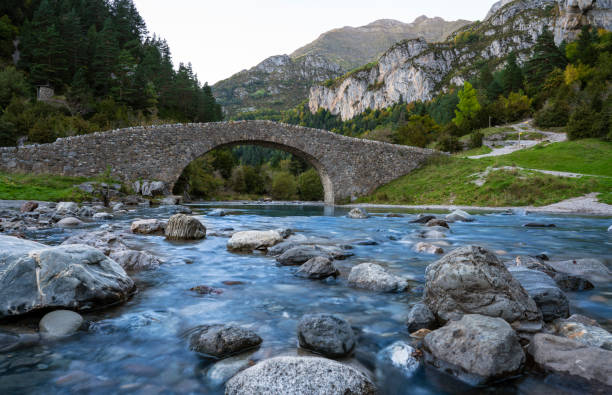 istock San Nicolas romanesque bridge Ara river Bujaruelo, Ordesa Huesca 1354643943