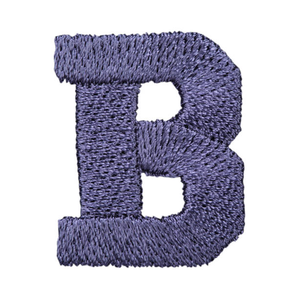 istock Blue embroidery designs alphabet letter b isolated on white background 1354644791