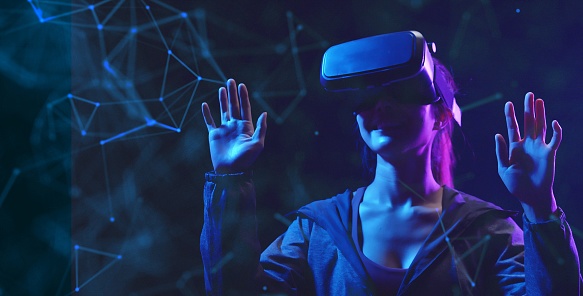 Metaverse VR juego de realidad virtual, juego de mujer metaverse tecnología digital virtual control de juegos con gafas VR photo