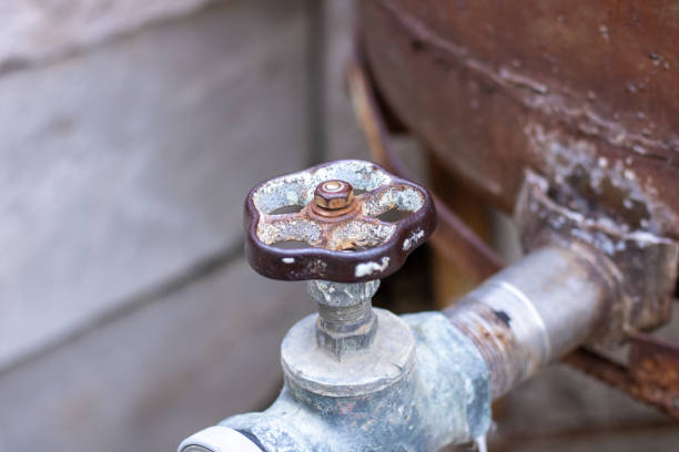 istock Rusty iron plumbing faucet. Old plumbing. 1354651118