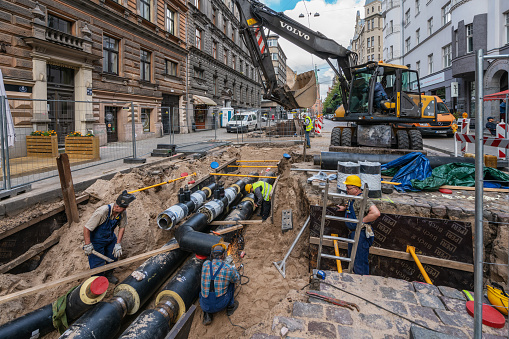 Riga, Latvia - August 30, 2021: Heat pipe replacement works on Gertrudes Street.