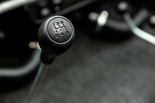 Close up of the manual gearbox transmission handle. Accelerator handle