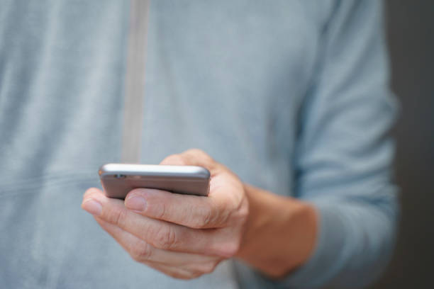 istock Social media a man using a smartphone 1354679939