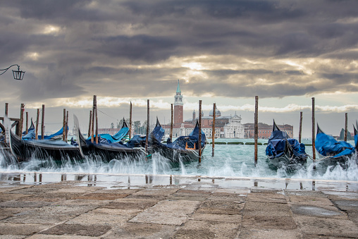 Moored Gondolas during High Tide at the St Marks Square, Venice, Italy