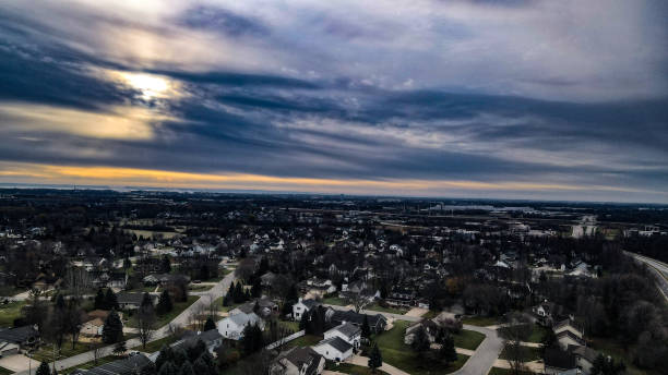 istock Autumn sun breaking thru to rural communities 1354681370