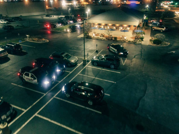 istock Parking lot abstract at night with police 1354683433