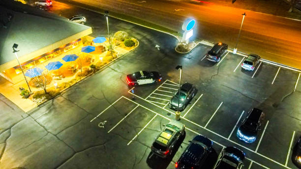 istock Parking lot abstract at night with police 1354689341