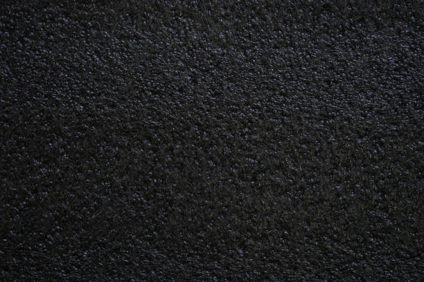 black background, porous seamless texture pattern - bitumen felt imagens e fotografias de stock