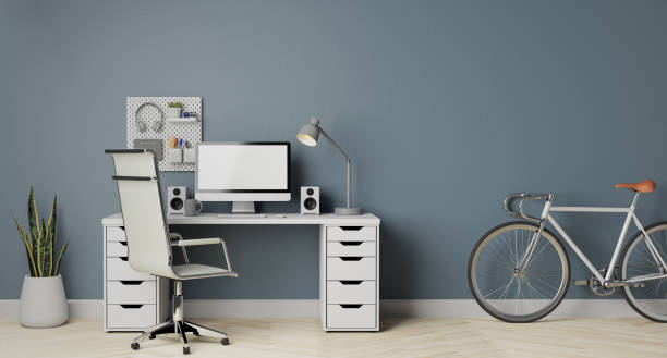 istock 3d illustration Modern computer monitor with the grey wall and bicycle 1354700348