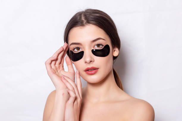 istock Eye black patch, Beautiful Woman With Natural Makeup 1354705581