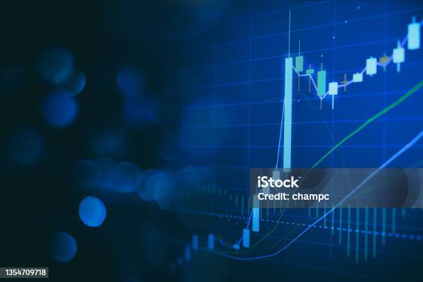 Close Up Financial Chart With Uptrend Line Graph In Stock Market On Defocused Blue Colour Bokeh Background Stock Photo - Download Image Now