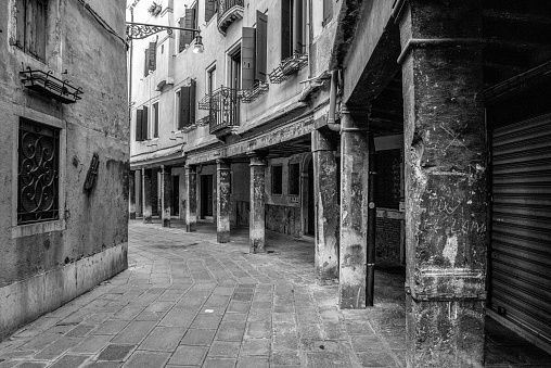 An abandoned bent alley in downtown Venice, Italy
