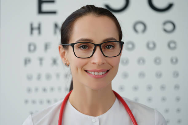 istock Beautiful young woman optometrist smiling, close-up 1354714690