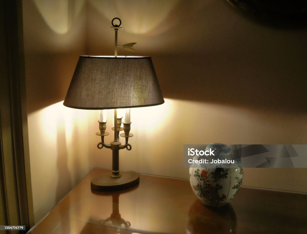 Old Lampshade Indoor a Classic Vintage Room Horizontal Photo of an Old Lampshade Indoor in a Low Lighting Classic Vintage Room Candlestick Holder Stock Photo