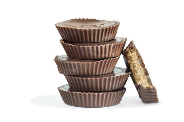 Chocolate peanut butter cup candy isolated over a white background stock photo