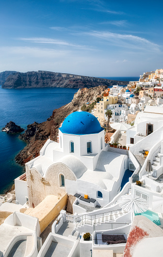 One of the famous blue domes in the beautiful village of Oia on Santorini, Greece