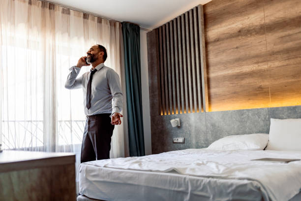 istock Mature metro man on phone with copy space 1354730001