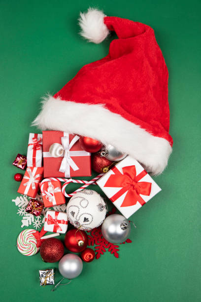 istock Christmas ornaments and Santa hat 1354731925
