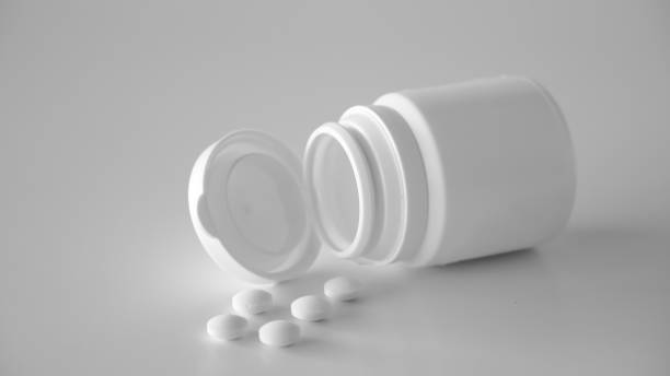 istock A pill bottle with pills on isolated background 1354733149