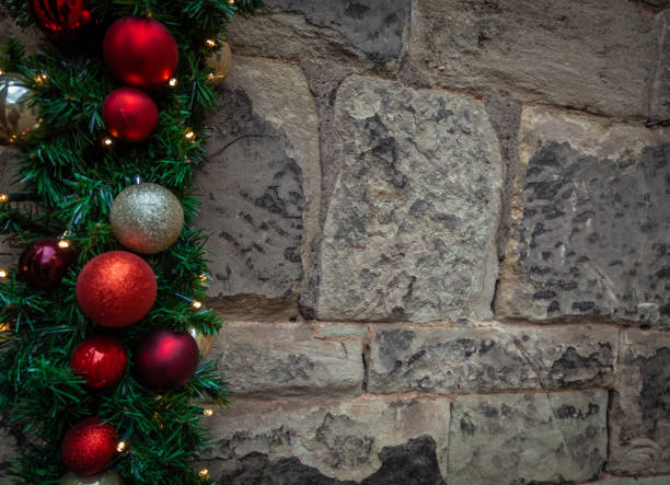 istock Christmas themed stone background with decorations 1354736282