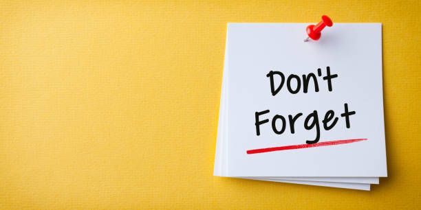 istock White Sticky Note With Don't Forget And Red Push Pin On Yellow Background 1354737917