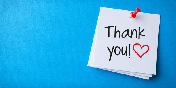 istock White Sticky Note With Thank You And Red Push Pin On Blue Background 1354737982