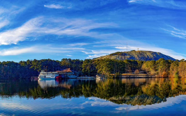 River boat docked with Stone mountain in the background stock photo
