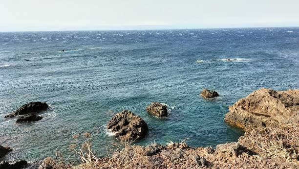 istock view of the sea and the cliffs on a sunny day 1354739603