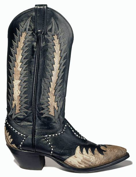Cowboy boots A worn cowboy boot on white background. cowboy boot stock pictures, royalty-free photos & images