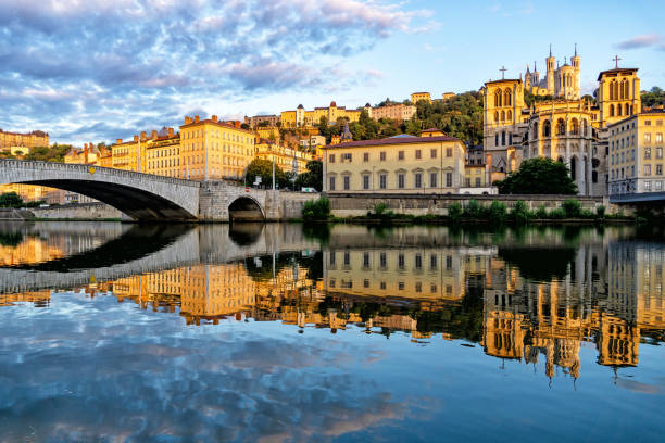 Saone river in Lyon Cathedral Saint Jean, Basilica Notre-Dame de Fourviere and the Saone river in Lyon city at morning, region Auvergne-Rhone-Alpes, Rhone, France lyon photos stock pictures, royalty-free photos & images