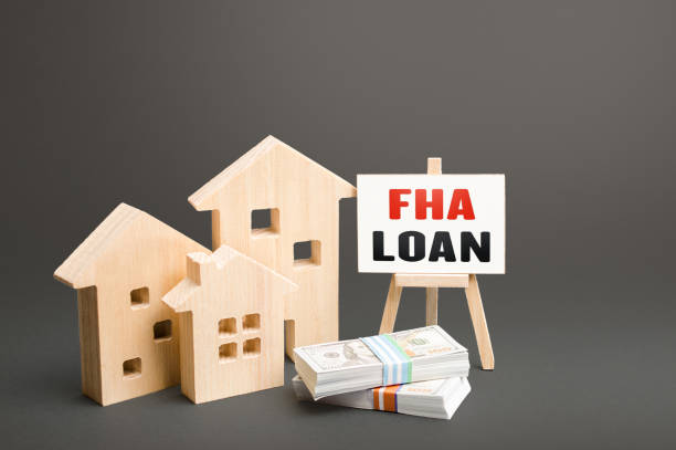 Residential buildings and easel with FHA loan. Mortgage insured by Federal Housing Administration Loan. An affordable financial instrument for borrowers with a low credit score. High risk of default edificios residenciales y caballete con préstamo de la fha. hipoteca asegurada por el préstamo de la administración federal de vivienda. un instrumento financiero asequible para prestatarios con un puntaje de crédito bajo. alto riesgo de impago