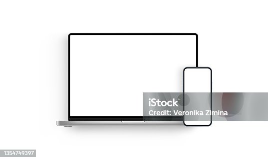 istock Laptop and Mobile Phone with Blank Screens 1354749397