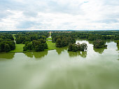 View down from Minaret tower to visitors and over castle lake to popular Lednice castle