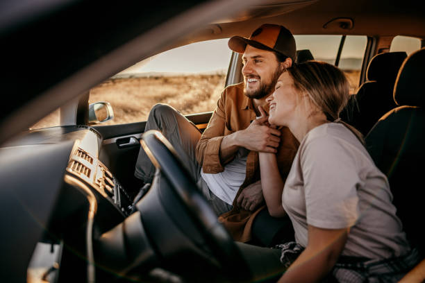 istock Loving couple on the road trip 1354753088