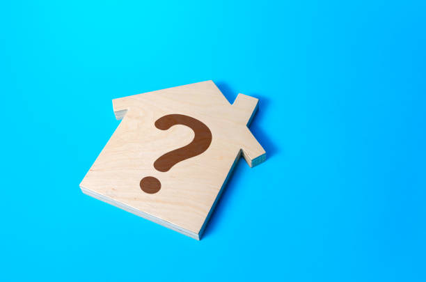 istock House with a question mark. Solving housing problems, deciding buy or rent real estate. Cost estimate. Search for options, choice type of residential buildings. Property price valuation evaluation 1354755444