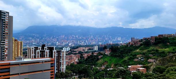 istock Medellin skyline and blue sky 1354756395