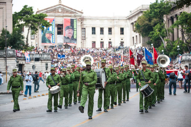 Military band playing a concert for a large crowd in Havana, Cuba. stock photo