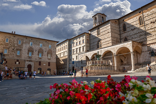 Perugia, Umbria, Italy. August 2020. Amazing view of Piazza IV Novembre with the historic fountain in evidence. Beautiful summer day, people in the square.