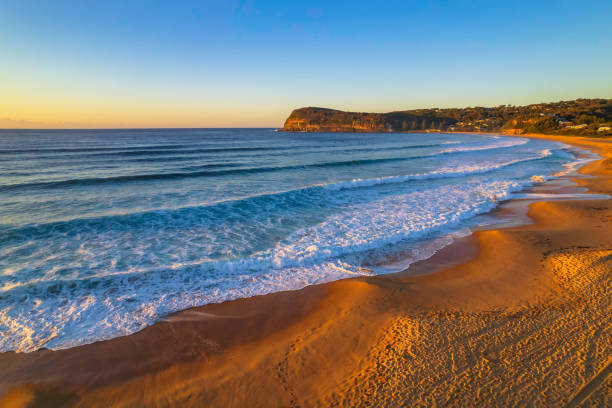 istock Surfs up aerial sunrise seascape 1354767873