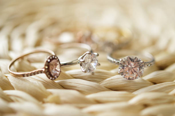 istock Jewelry diamond wedding rings close up 1354775023