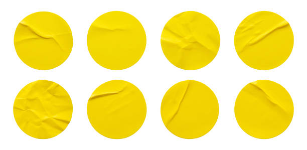 istock Yellow round paper sticker label set isolated on white background 1354775034