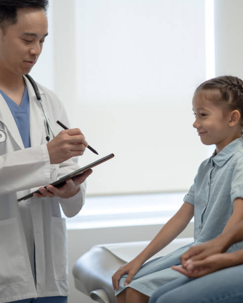 istock Little Girl at the Doctors 1354775547