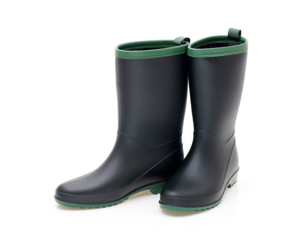 istock Pair of black waterproof rubber boots 1354779092