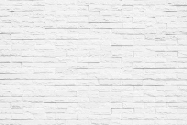 istock White grunge brick wall texture background for stone tile block painted in grey light color wallpaper modern interior and exterior and room backdrop design 1354800620