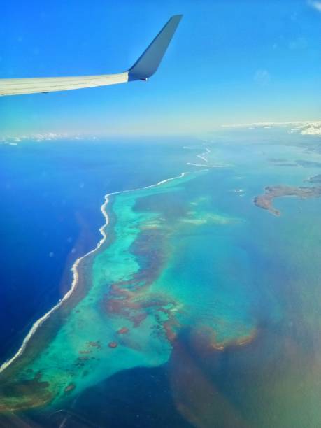 New Caledonia island view from airplane window, beautiful place holiday and vacation. New Caledonia island view from airplane window, beautiful place holiday and vacation. french overseas territory stock pictures, royalty-free photos & images
